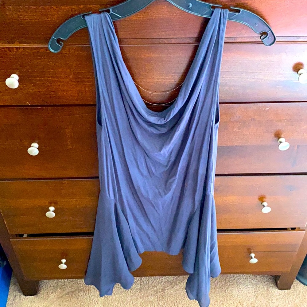 Unique asymmetrical chiffon jewel open back top